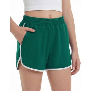 image:imageStelle Girls Athletic Shorts with Pockets Quick Dry Running Shorts Gymnastics Basketball Short for Teen KidsEvergreen