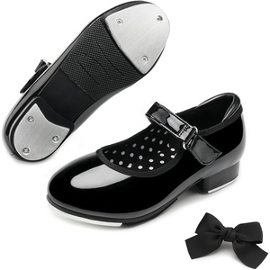 image:imageStelle Toddler Tap Shoes with Detachable BowToddlerLittle KidBig Kid  Detachable ribbon bow accentHookandloopSteel toe heel tapsCushioned insolePadded heel collarBlack