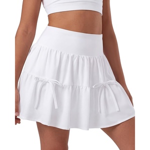 image:imageStelle Womens High Waist Athletic Skorts Flowy Mini Cake Skirt Casual Skorts with Shorts PocketWhite